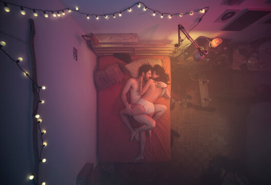 Intimate moment of a couple on bed