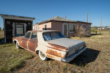 San Jon, New Mexico - Old abandoned motel along Route 66, with classic car parked out front - obrazy, fototapety, plakaty