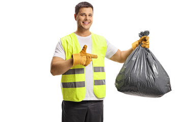 Garbageman holding a black bin bag and pointing - obrazy, fototapety, plakaty