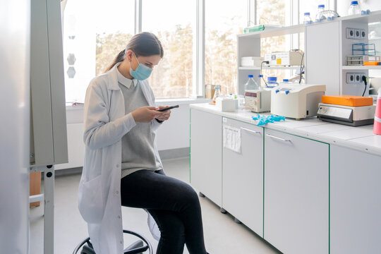 Female Researcher Using Cellphone