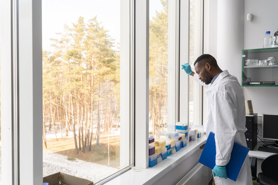 Pensive Scientist Near To Window