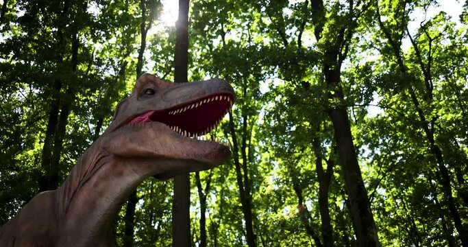 the moving model of Tyrannosaurus rex in dinopark, the predator dinosaur of prehistoric period