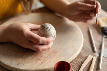 Close up photo of easter pottery egg
