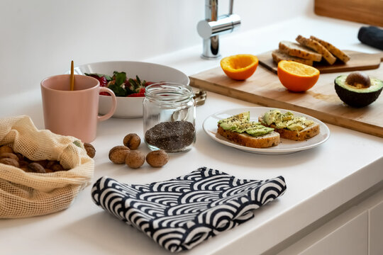 Healthy breakfast meal and ingredients on kitchen counter