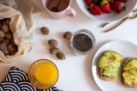 Healthy breakfast meal and ingredients on kitchen counter