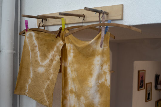 Two tie-dye cloths in process