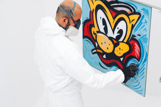 Street Artist Working In Studio On Graffiti illustration.