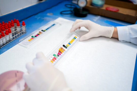 Hands Holding API Test In The Lab. 