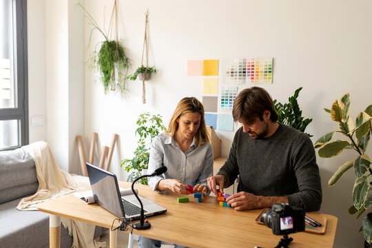 couple recording video at home