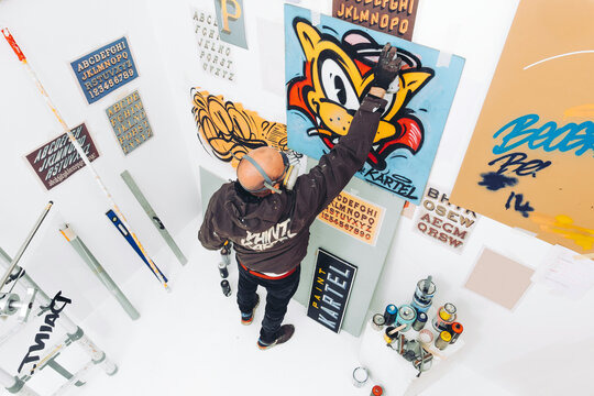 Street Artist Working In Studio On Graffiti Illustratiions