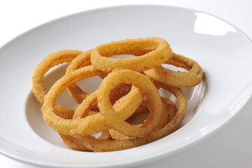 Onion rings in a white background