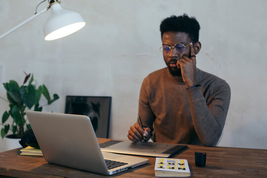 Man Working With Laptop At Office
