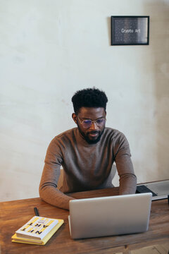 Man Working With Laptop At Office