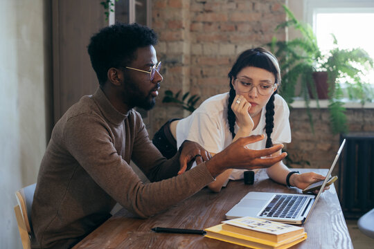 Friends Learning NFT Together In A Office