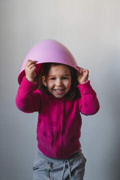 Lovely Child Play with Pink Easter Egg