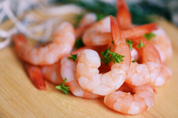 Shrimp peeled on white wooden ready for cooking, Fresh shrimps or prawns seafood and shellfish boiled shrimp