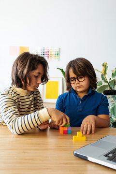 Kids Doing Puzzle together