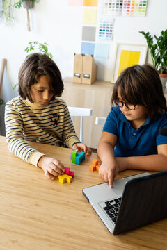 Kids Doing Puzzle together