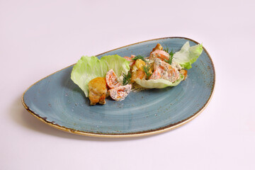 Grilled chicken breast, fillet and fresh vegetable salad of lettuce, arugula, spinach, cucumber and tomato. Healthy lunch menu. Diet food.