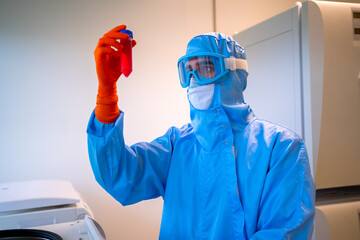 Scientific Wearing A Anti Pathogen Protective Suit. 