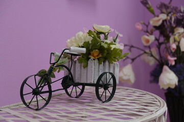 flower pot in the form of a vintage tricycle