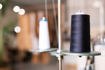 Close up Of skeins of yarn ok a Sewing Machine In an Atelier