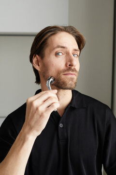 Modern Man Doing Face Skin Massage