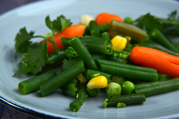 fried vegetables grilled, served on a plate, vegetarian healthy meal closeup
