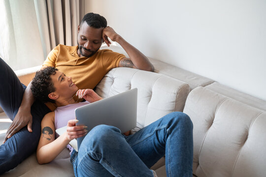 Couple Laying On Couch