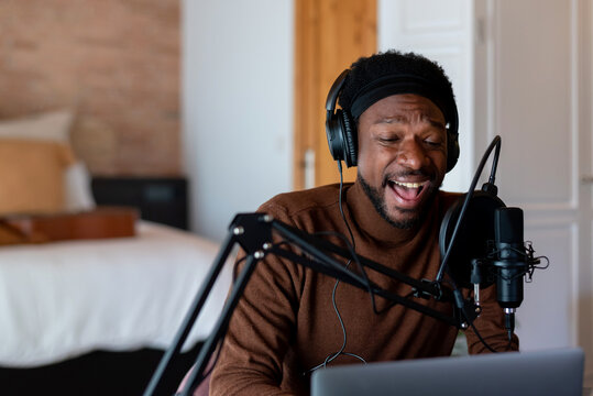 Black blogger singing at home