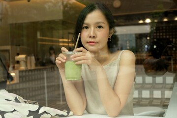 Asian women with matcha green tea