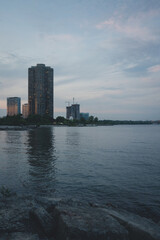Obraz premium Waterfront View of City during Sunset