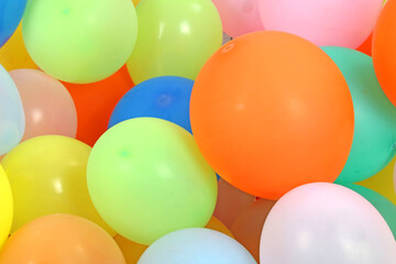 Colored balloon pool seen from above