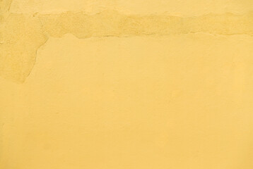 Closeup Yellow wall cement texture.