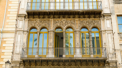 Fototapeta na wymiar Catania, Sicily. Facade of Teatro Sangiorgi, finished at 1900. Designed by architect Salvatore Giuffrida in a Liberty style.