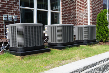 AC units attached to apartment building