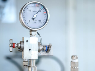 Pressure gauge of measuring instrument close up in industry zone at power plant with closed up