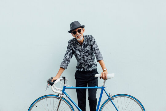 Senior Asian Man With Road Bicycle
