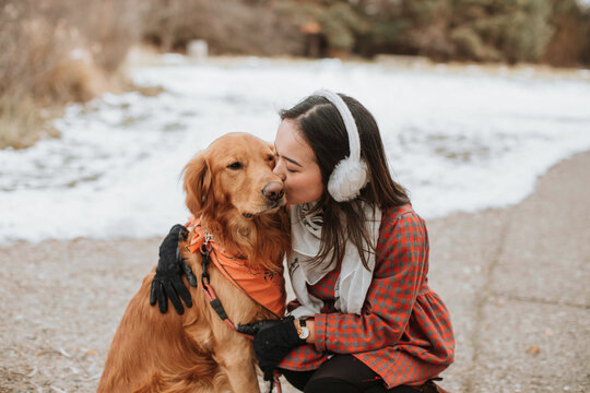 Woman Affectionate with Her Dog