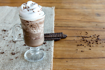 Cold frappe coffee with whipped cream. Iced frappuccino.