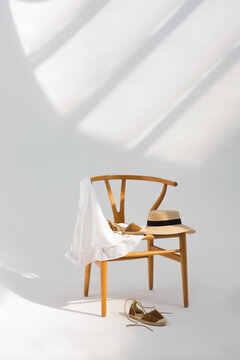 Clothing complements on modern chair 