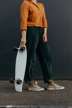 Young with white skateboard