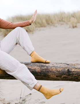 Trendy Young Woman In Fun Yellow Socks 