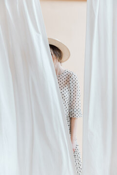Girl in a Polka Dot Dress and Hat