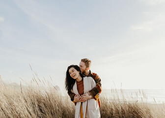 Couple in sand dunes