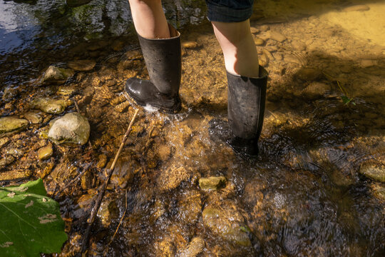 Woman in river water
