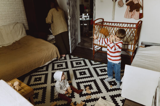 Portrait Of Children Playing In The House