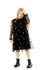 Cute little girl in a light summer dress.