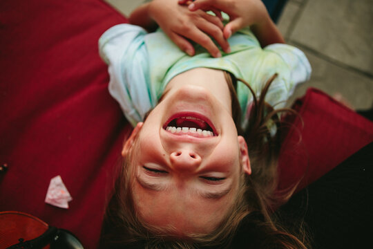 overhead view of girl laughing 