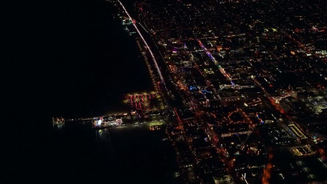 Aerial View Of The Santa Monica Pier And Third Street Promenade At Night Looking North